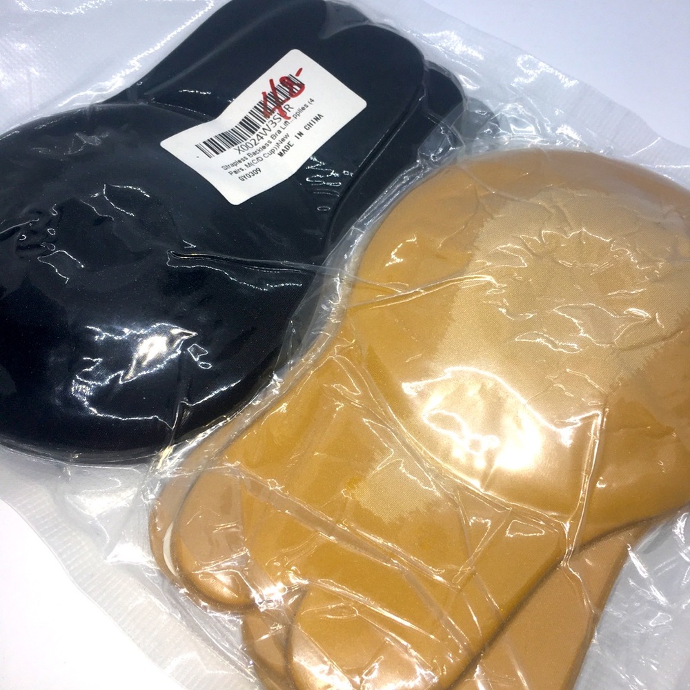 Stick on Bra. NEW in plastic. 4 pairs. Large black and brown
